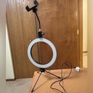 Influencer ring light with phone holder.